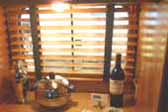 Photo shows elegant wooden venetian blinds in a 1948 Westcraft Sequoia Trailer